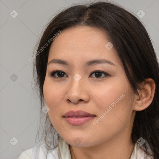 Joyful asian young-adult female with medium  brown hair and brown eyes