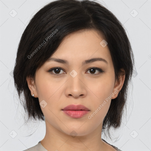 Joyful asian young-adult female with medium  black hair and brown eyes