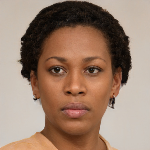 Neutral black young-adult female with short  brown hair and brown eyes