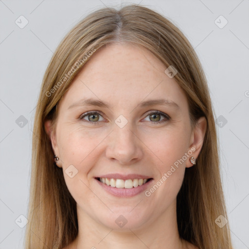 Joyful white young-adult female with long  brown hair and grey eyes