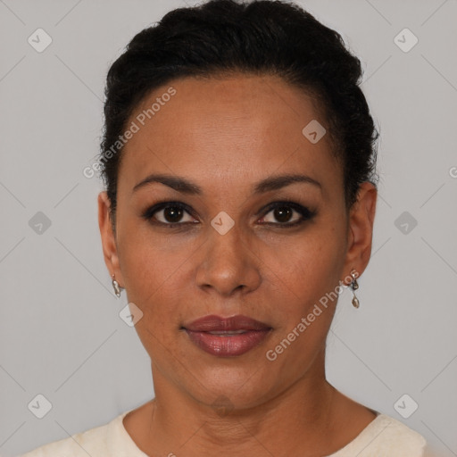 Joyful black young-adult female with short  black hair and brown eyes