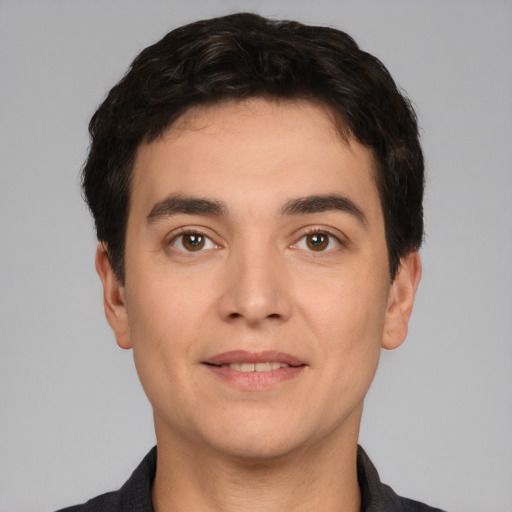 Neutral white young-adult male with short  black hair and brown eyes