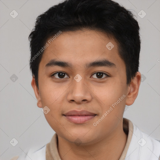 Joyful latino young-adult male with short  brown hair and brown eyes