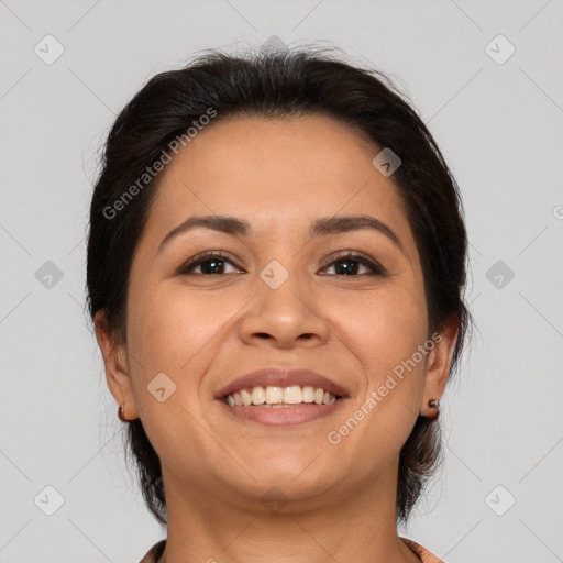 Joyful white adult female with medium  brown hair and brown eyes