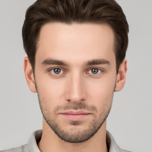 Neutral white young-adult male with short  brown hair and brown eyes