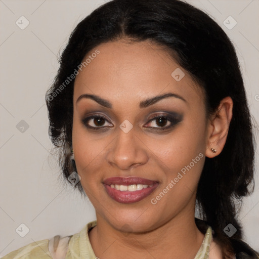 Joyful latino young-adult female with medium  brown hair and brown eyes