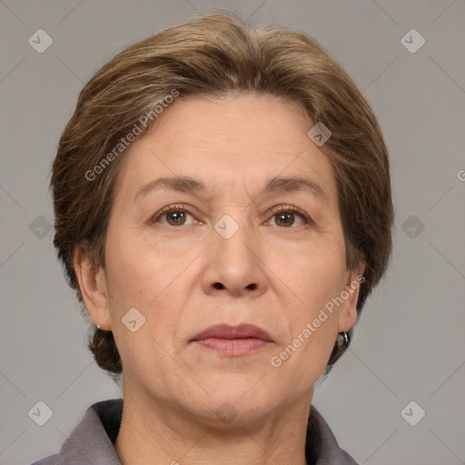 Joyful white adult female with medium  brown hair and grey eyes