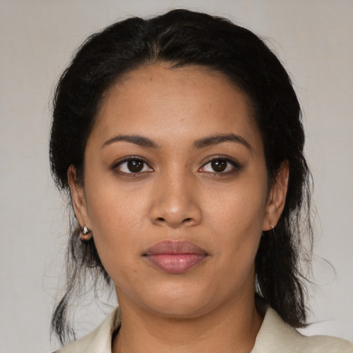 Neutral latino young-adult female with medium  black hair and brown eyes