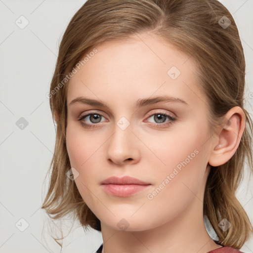 Neutral white young-adult female with long  brown hair and blue eyes