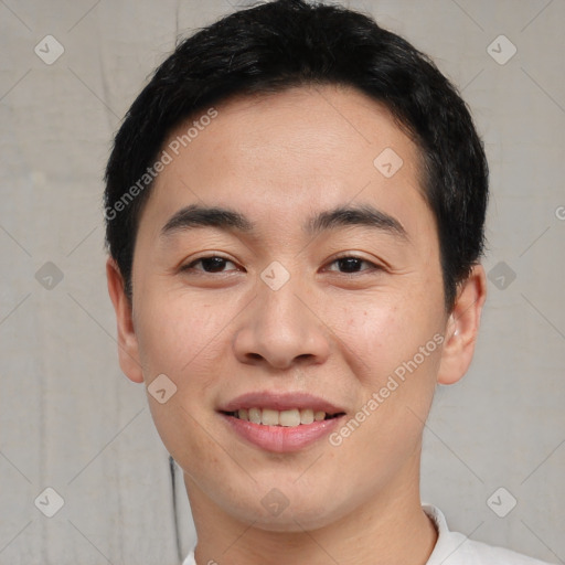 Joyful asian young-adult male with short  black hair and brown eyes