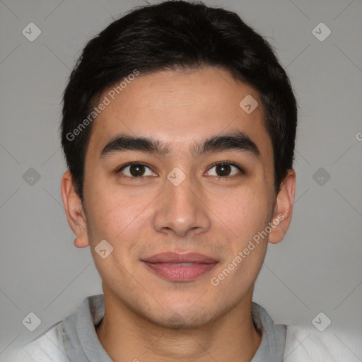 Joyful latino young-adult male with short  brown hair and brown eyes