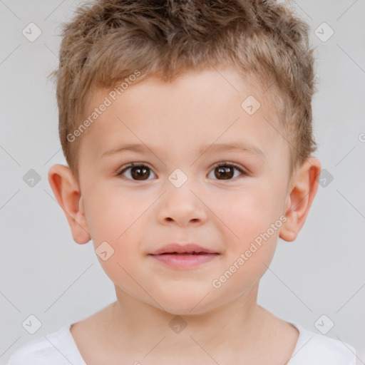 Joyful white child male with short  brown hair and brown eyes