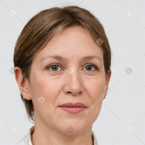 Joyful white adult female with short  brown hair and grey eyes