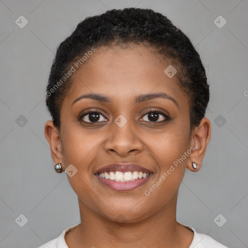 Joyful black young-adult female with short  brown hair and brown eyes