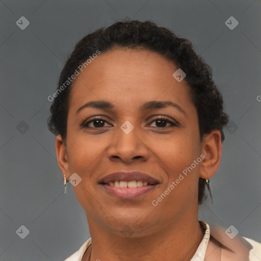 Joyful latino young-adult female with short  brown hair and brown eyes