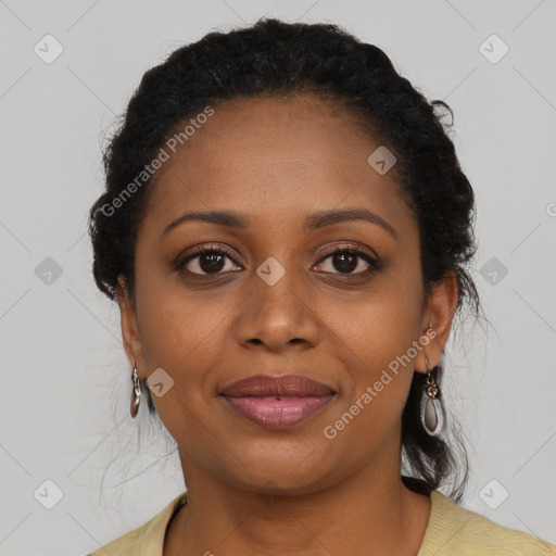 Joyful black young-adult female with medium  brown hair and brown eyes