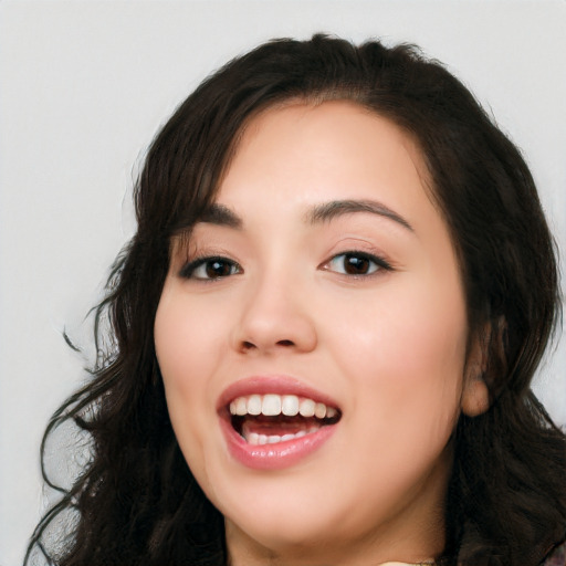 Joyful white young-adult female with long  black hair and brown eyes