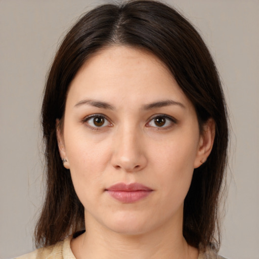 Neutral white young-adult female with medium  brown hair and brown eyes