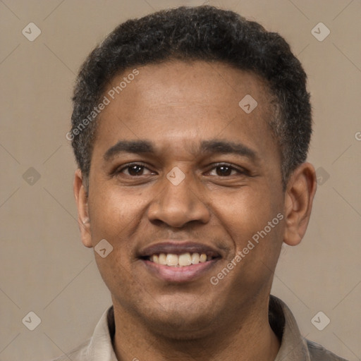 Joyful latino adult male with short  black hair and brown eyes