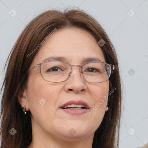 Joyful white adult female with long  brown hair and brown eyes