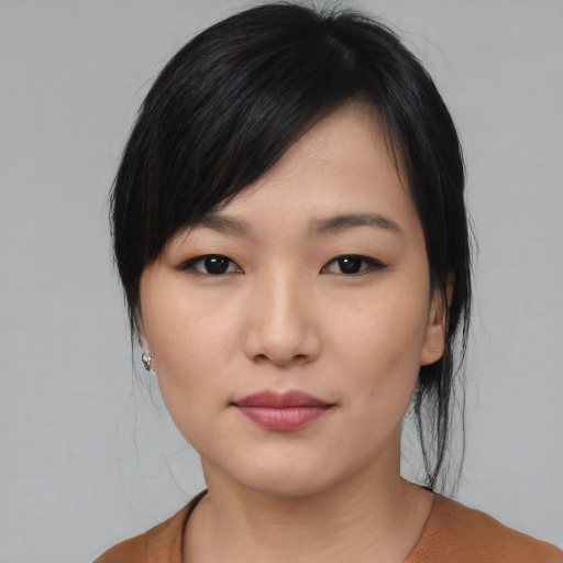Neutral asian young-adult female with medium  black hair and brown eyes