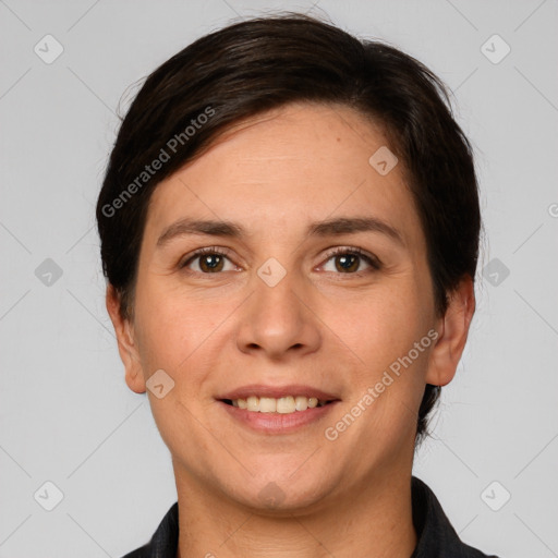 Joyful white adult female with short  brown hair and brown eyes