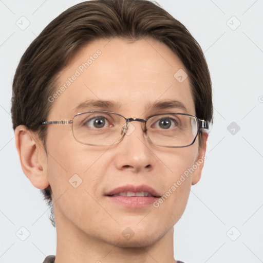 Joyful white adult female with short  brown hair and grey eyes