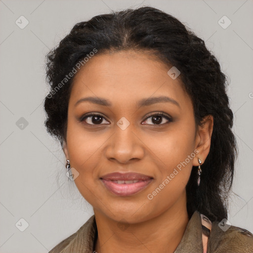 Joyful black young-adult female with long  brown hair and brown eyes