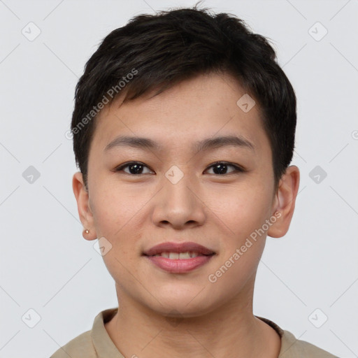 Joyful asian young-adult female with short  brown hair and brown eyes