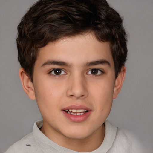 Joyful white child male with short  brown hair and brown eyes