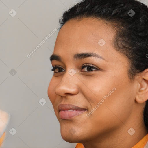 Joyful latino young-adult female with short  brown hair and brown eyes