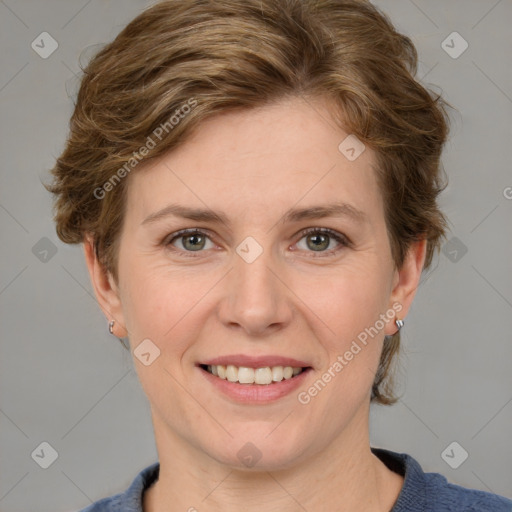 Joyful white young-adult female with medium  brown hair and blue eyes