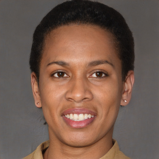 Joyful latino young-adult female with short  brown hair and brown eyes