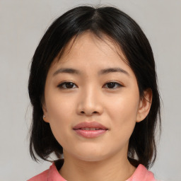 Neutral asian young-adult female with medium  brown hair and brown eyes