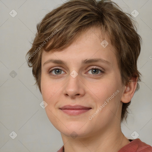 Joyful white young-adult female with medium  brown hair and green eyes