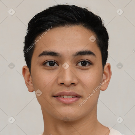 Joyful asian young-adult male with short  brown hair and brown eyes