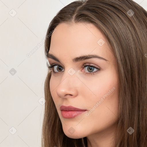 Neutral white young-adult female with long  brown hair and brown eyes