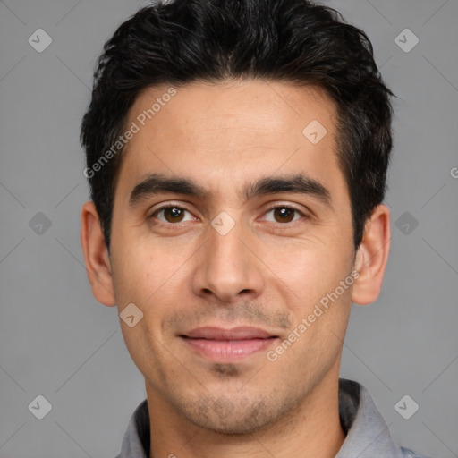 Joyful white young-adult male with short  black hair and brown eyes