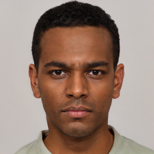 Neutral black young-adult male with short  black hair and brown eyes