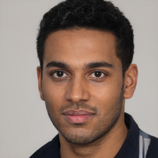 Neutral black young-adult male with short  black hair and brown eyes