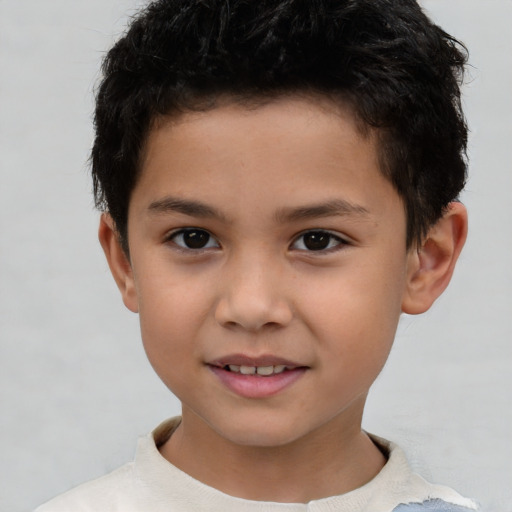 Joyful asian child male with short  brown hair and brown eyes