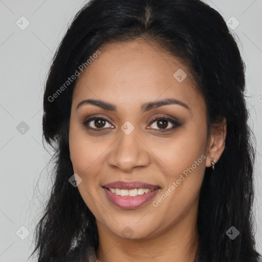 Joyful latino young-adult female with long  brown hair and brown eyes