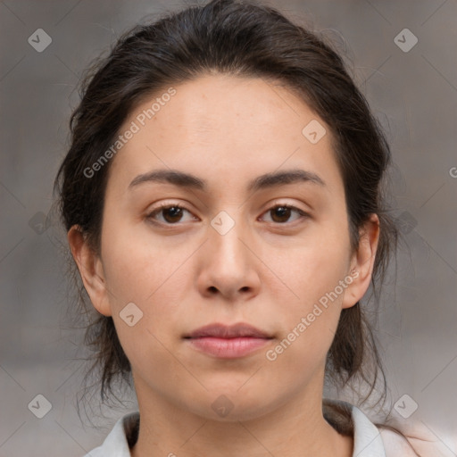 Neutral white young-adult female with medium  brown hair and brown eyes