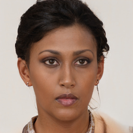 Neutral latino young-adult female with short  brown hair and brown eyes