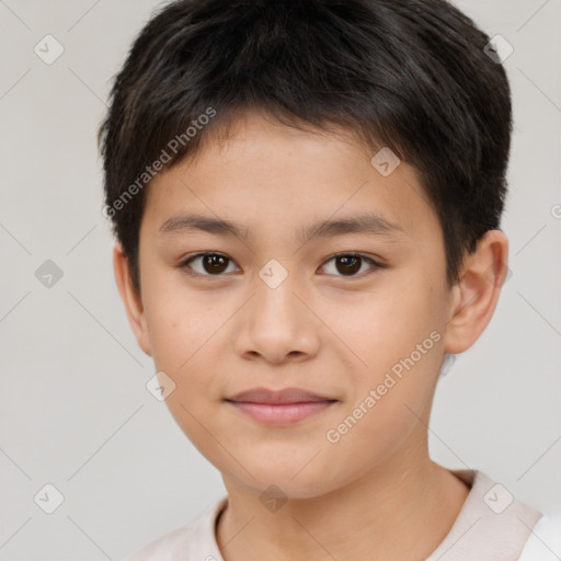 Joyful white child male with short  brown hair and brown eyes