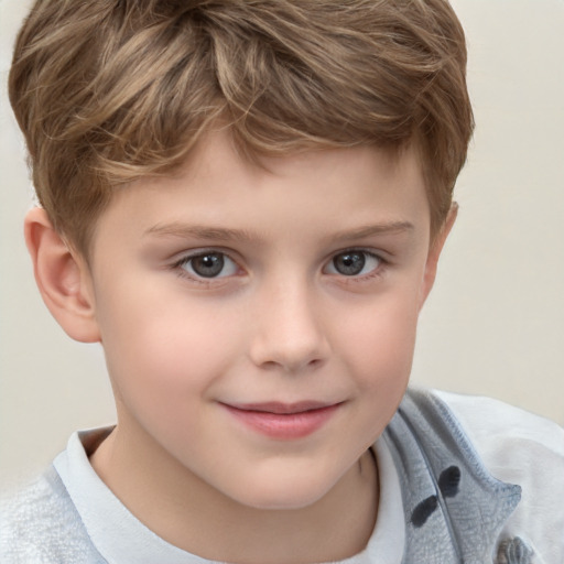 Joyful white child male with short  brown hair and grey eyes