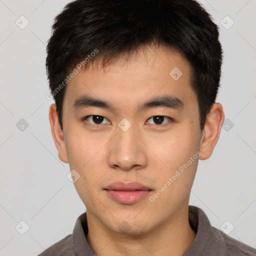 Neutral asian young-adult male with short  brown hair and brown eyes