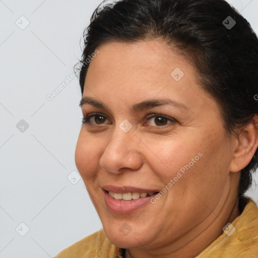 Joyful white adult female with short  brown hair and brown eyes