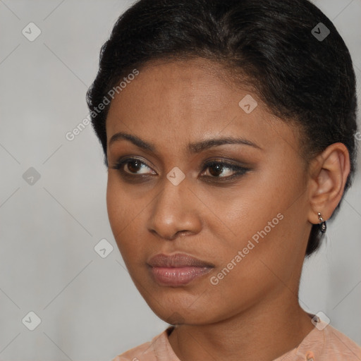 Neutral black young-adult female with short  brown hair and brown eyes