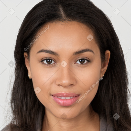 Joyful latino young-adult female with long  brown hair and brown eyes